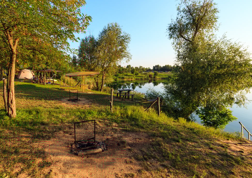 on camping pitch near summer lake shore